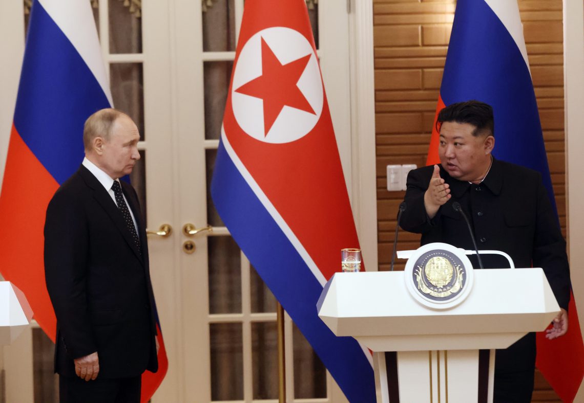 Vladimir Putin and Kim Jong-un